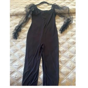 Fashionable and comfy black jumpsuit with sheer puff/balloon sleeve